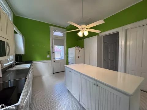 Kitchen - 409 E Washington St, Centerville, IA 52544 photo 2 of 2