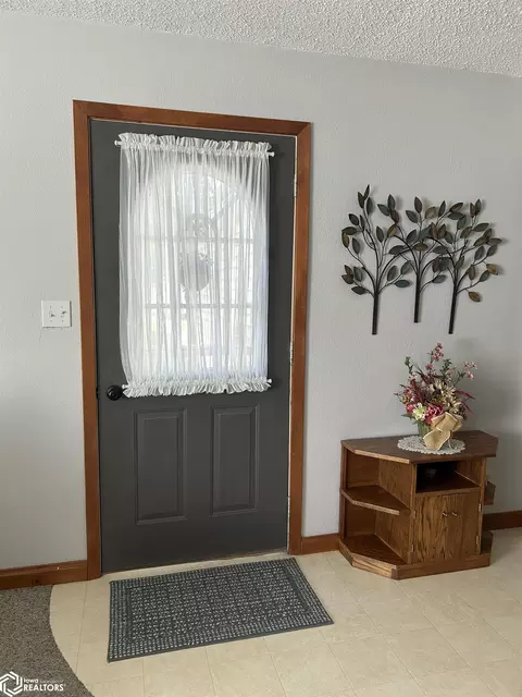 Entry Way - 220 5th Ave NE, Hampton, IA 50441 photo 1 of 2