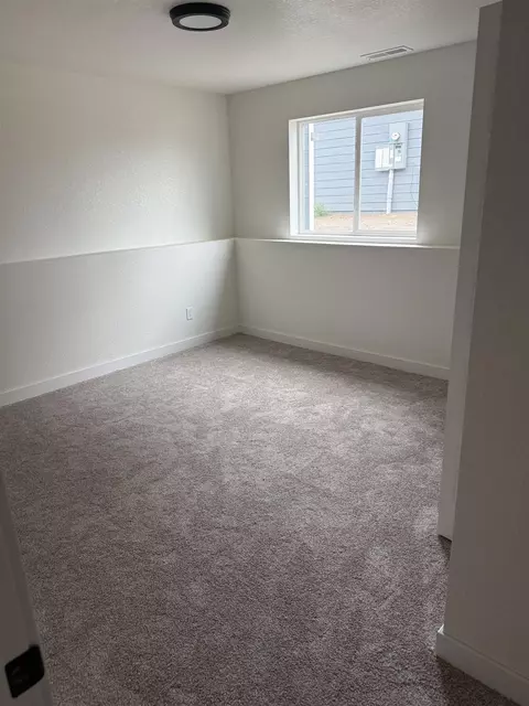 Bedroom - 668 Eagle Ct, Box Elder, SD 57719 photo 2 of 9