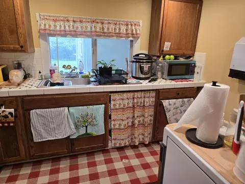 Kitchen - 230 W 230 12 234 W Ohio St, Spearfish, SD 57783 photo 1 of 4