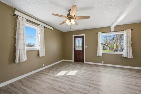 Living - 830 Lawrence St, Belle Fourche, SD 57717 photo 2 of 4
