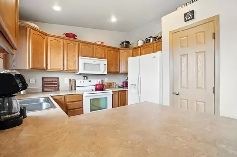 Kitchen - 493 Eisenhower Ln, Box Elder, SD 57719 photo 2 of 2