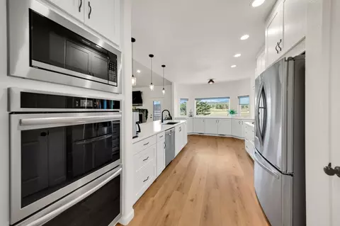 Kitchen - 10825 Quaal Rd, Black Hawk, SD 57718 photo 2 of 2