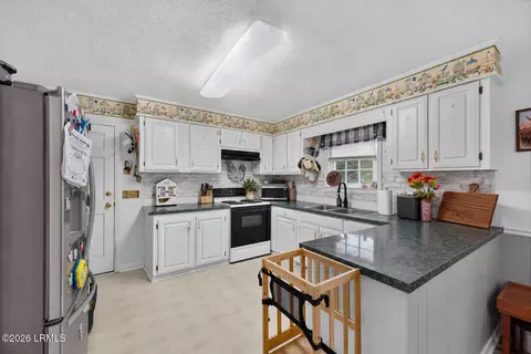 Kitchen - 205 Second St, Norway, SC 29113 photo 2 of 3