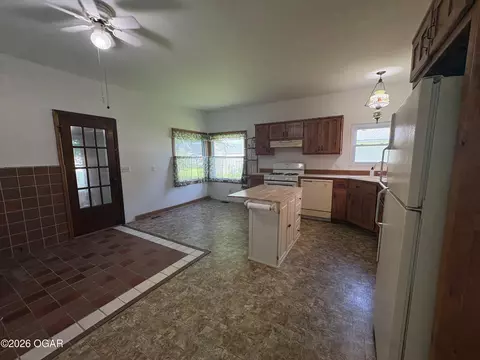 Kitchen - 1303 Walnut Street Lamar Mo 64759 St, Lamar, MO 64759 photo 2 of 4