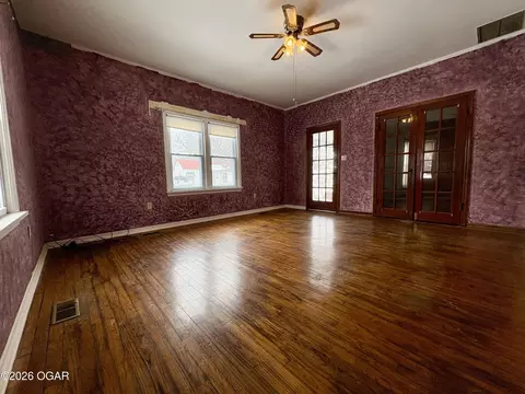 Living - 1303 Walnut Street Lamar Mo 64759 St, Lamar, MO 64759 photo 1 of 2
