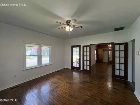 Living - 1303 Walnut Street Lamar Mo 64759 St, Lamar, MO 64759 photo 1 of 2
