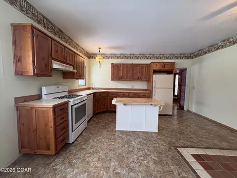 Kitchen - 1303 Walnut Street Lamar Mo 64759 St, Lamar, MO 64759 photo 2 of 4