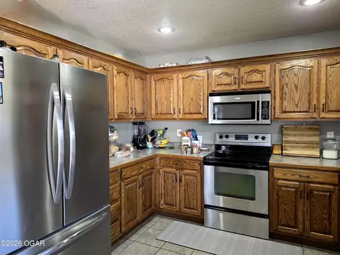 Kitchen - 807 Hawthorne Loop Webb City Mo 64870 Loop, Webb City, MO 64870 photo 1 of 2