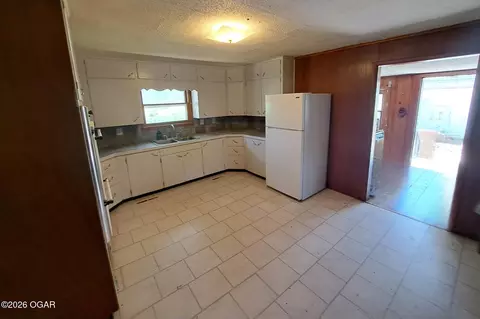 Kitchen - 710 E 1st Street Scammon Ks 66773 St, Scammon, KS 66773 photo 1 of 2