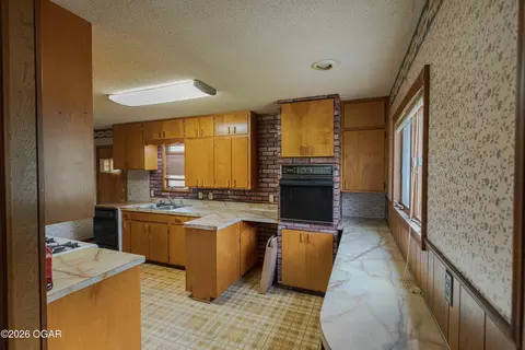 Kitchen - 107 W 4th Street Lamar Mo 64759 St, Lamar, MO 64759 photo 3 of 3