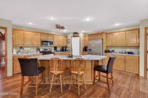 Kitchen - 13830 E Musket Road Nevada Mo 64772 Rd, Nevada, MO 64772 photo 5 of 7