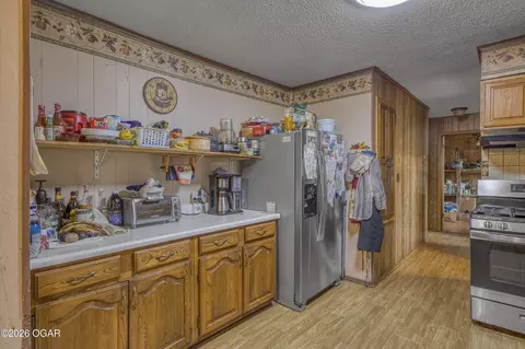 Kitchen - 1345 E Highland Avenue Carthage Mo 64836 Ave, Carthage, MO 64836 photo 2 of 2