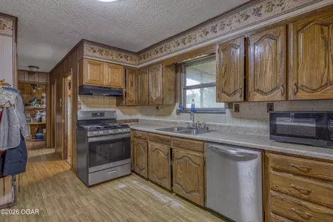 Kitchen - 1345 E Highland Avenue Carthage Mo 64836 Ave, Carthage, MO 64836 photo 1 of 2