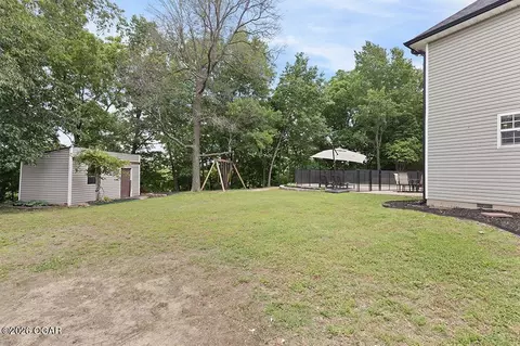 Exterior - 105 Briarbrook Drive Carl Junction Mo 64834 Dr, Carl Junction, MO 64834 photo 5 of 9