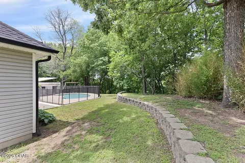 Exterior - 105 Briarbrook Drive Carl Junction Mo 64834 Dr, Carl Junction, MO 64834 photo 7 of 9