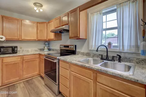 Kitchen - 1001 E 12th Street Lamar Mo 64759 St, Lamar, MO 64759 photo 1 of 2
