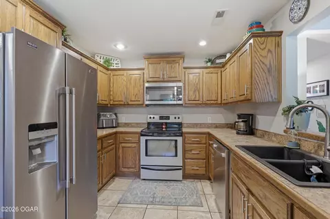 Kitchen - 203 E 5th Street Purcell Mo 64857 St, Purcell, MO 64857 photo 2 of 2