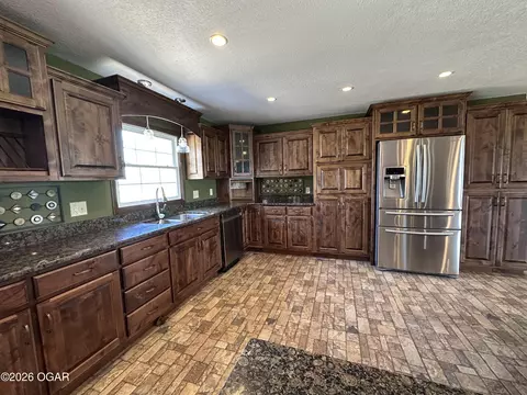 Kitchen - 9609 Base Line Boulevard Jasper Mo 64755 Blvd, Jasper, MO 64755 photo 2 of 4