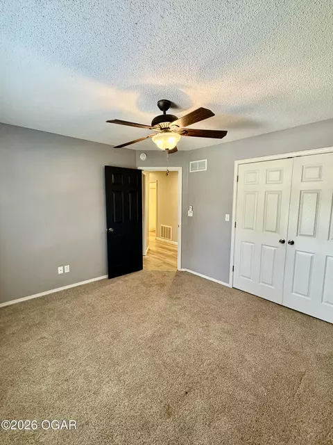 Bedroom - 219 Powell Drive Webb City Mo 64870 Dr, Webb City, MO 64870 photo 3 of 5