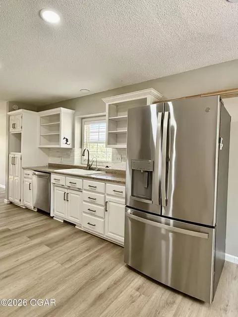 Kitchen - 219 Powell Drive Webb City Mo 64870 Dr, Webb City, MO 64870 photo 5 of 7