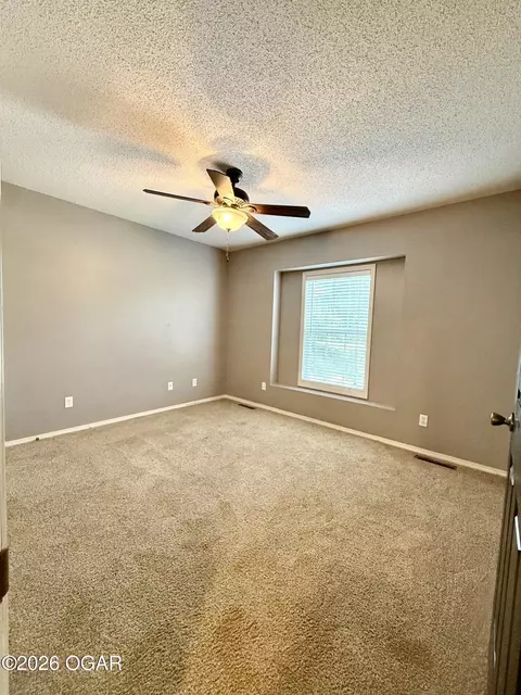 Bedroom - 219 Powell Drive Webb City Mo 64870 Dr, Webb City, MO 64870 photo 4 of 5
