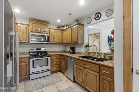 Kitchen - 203 E 5th Street Purcell Mo 64857 St, Purcell, MO 64857 photo 1 of 2