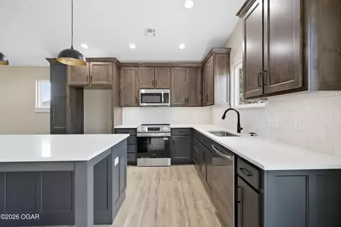 Kitchen - 2202 Modern Avenue Carthage Mo 64836 Ave, Carthage, MO 64836 photo 3 of 4