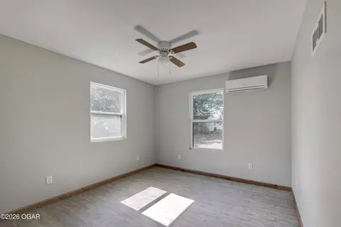 Bedroom - 717 Benham Avenue Neosho Mo 64850 Ave, Neosho, MO 64850 photo 6 of 11