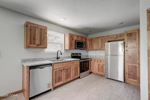 Kitchen - 717 Benham Avenue Neosho Mo 64850 Ave, Neosho, MO 64850 photo 1 of 3