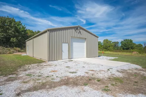 Exterior - 43 Spring Flood Road Goodman Mo 64843 Rd, Goodman, MO 64843 photo 9 of 9