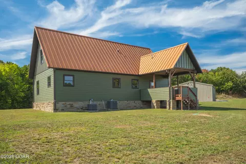 Exterior - 43 Spring Flood Road Goodman Mo 64843 Rd, Goodman, MO 64843 photo 6 of 9