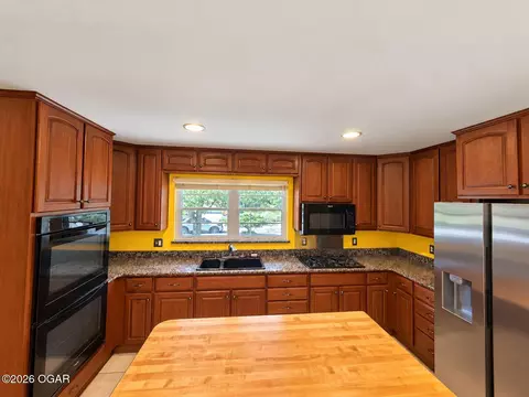 Kitchen - 2402 E 11th Street Joplin Mo 64801 St, Joplin, MO 64801 photo 1 of 4