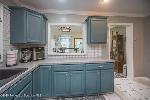 Kitchen - 705 E Grant St, Olyphant, PA 18447 photo 3 of 4