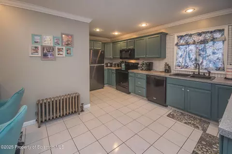 Kitchen - 705 E Grant St, Olyphant, PA 18447 photo 1 of 4