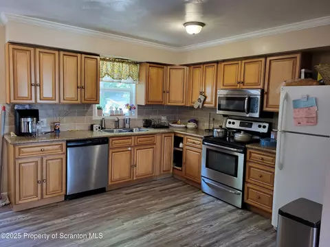 Kitchen - 134 Taroli St, Old Forge, PA 18518 photo 1 of 2