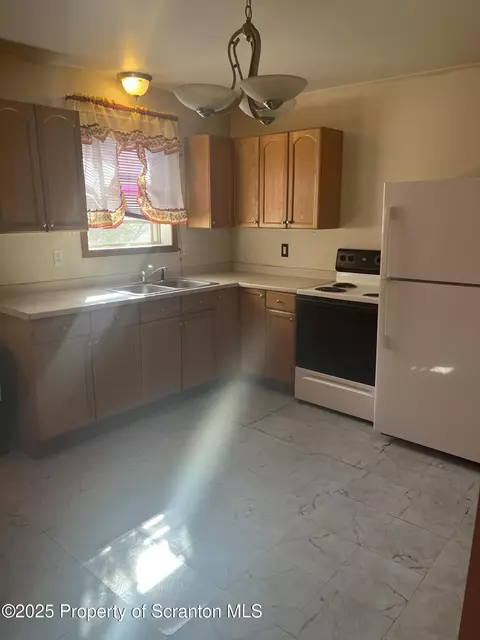 Kitchen - 533 E Pine St, Olyphant, PA 18447 photo 1 of 2