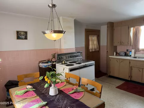 Kitchen - 710 Maple St, Old Forge, PA 18518 photo 2 of 2