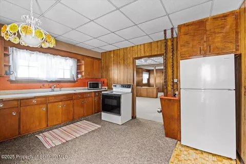 Kitchen - 701 E Scott St, Olyphant, PA 18447 photo 1 of 2