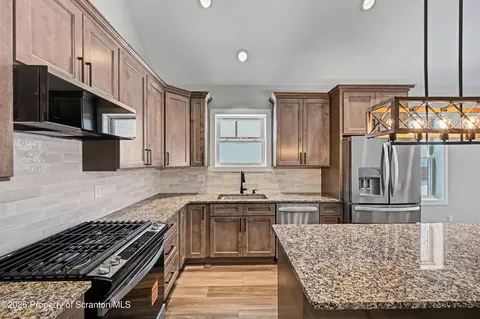 Kitchen - 115 E Pine St, Dunmore, PA 18512 photo 2 of 4