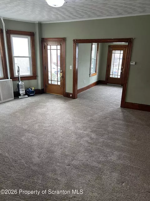 Living - 415 Susquehanna Ave, Olyphant, PA 18447 photo 4 of 6