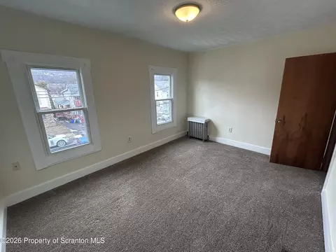 Bedroom - 415 Susquehanna Ave, Olyphant, PA 18447 photo 2 of 6
