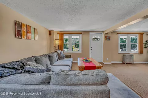 Living - 1061 Springbrook Ave, Moosic, PA 18507 photo 1 of 3