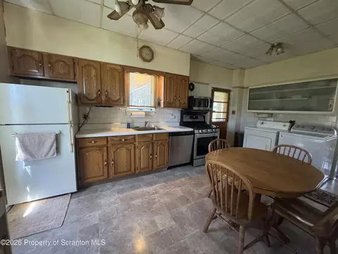 Kitchen - 409 E Warren St, Dunmore, PA 18512 photo 1 of 2