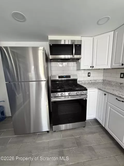 Kitchen - 18 Center St, Wilkes Barre, PA 18705 photo 2 of 3