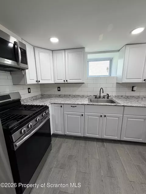 Kitchen - 18 Center St, Wilkes Barre, PA 18705 photo 3 of 3