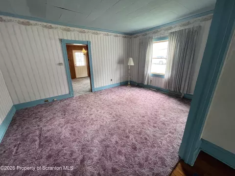 Living - 301 Milwaukee Ave, Old Forge, PA 18518 photo 4 of 4