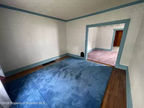 Living - 301 Milwaukee Ave, Old Forge, PA 18518 photo 3 of 4