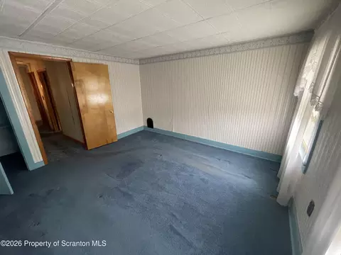 Bedroom - 301 Milwaukee Ave, Old Forge, PA 18518 photo 5 of 6