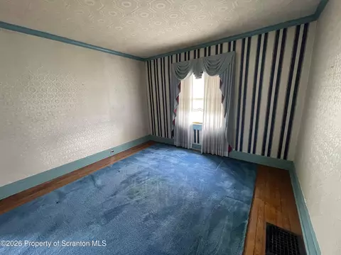 Bedroom - 301 Milwaukee Ave, Old Forge, PA 18518 photo 1 of 6